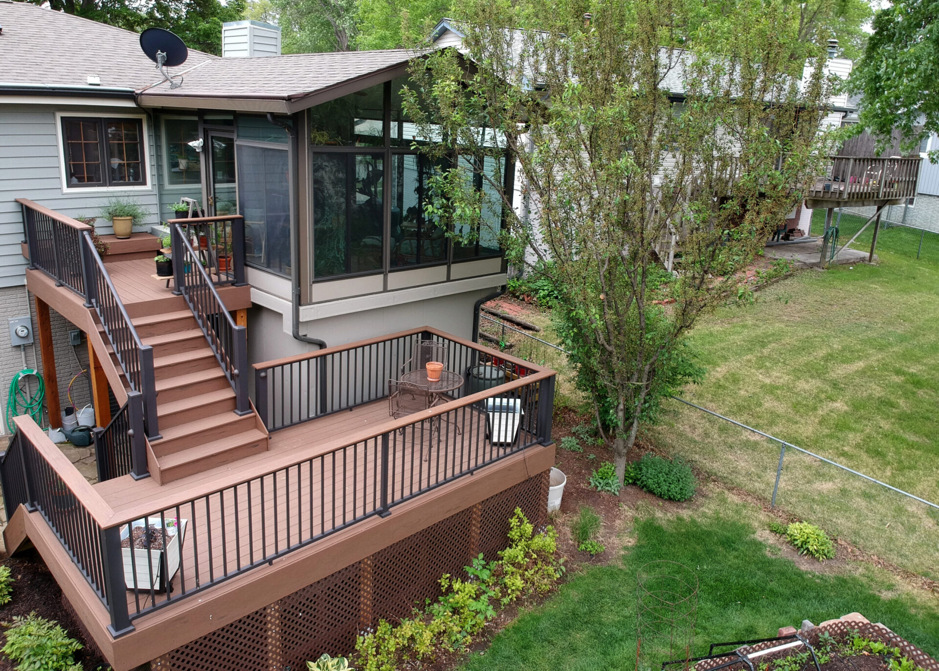 Remodeled,Home,With,Sunroom,And,Composite,Deck