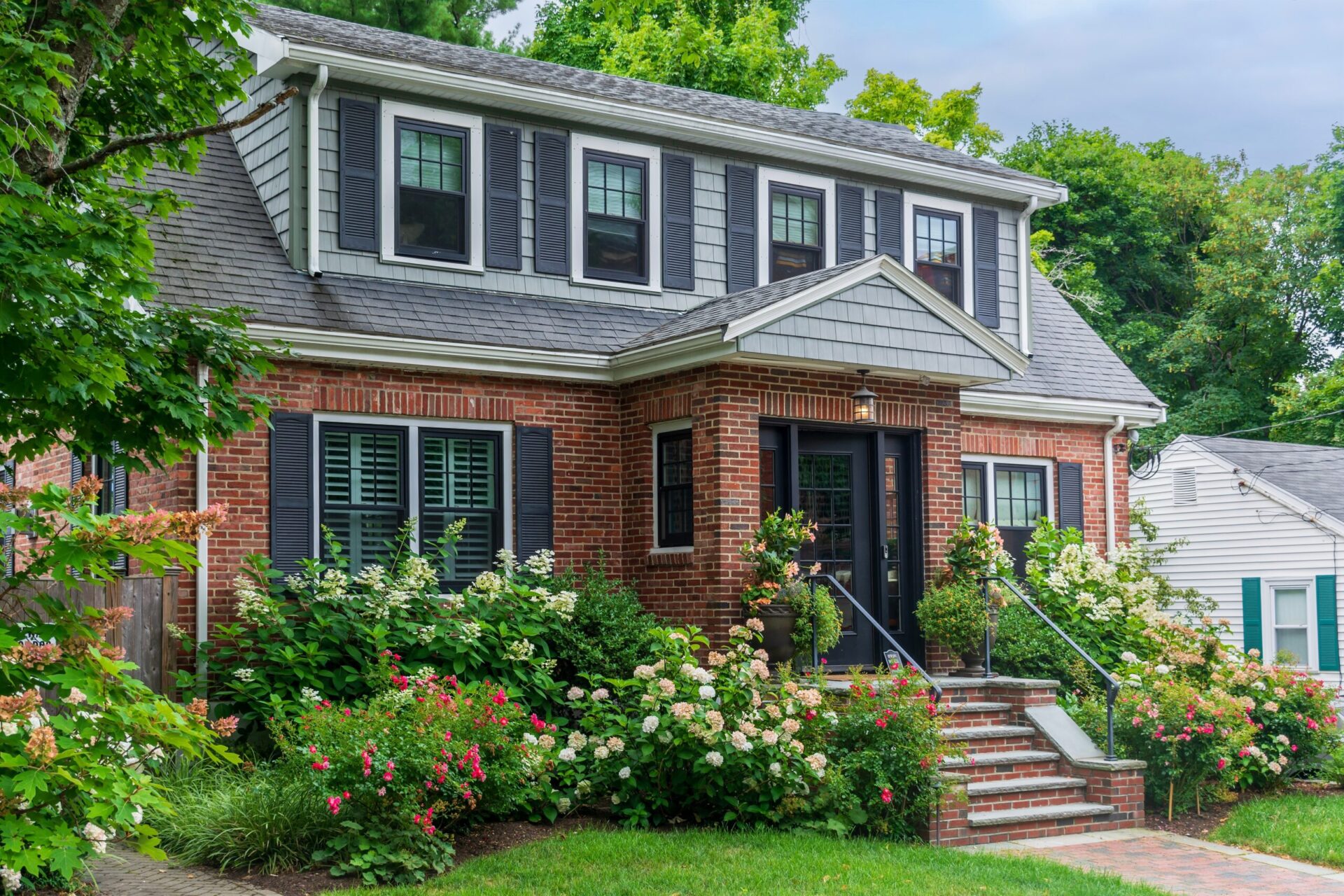 Charming,Classic,Family,House,Surrounded,By,Beautiful,Blooming,Flowers,And