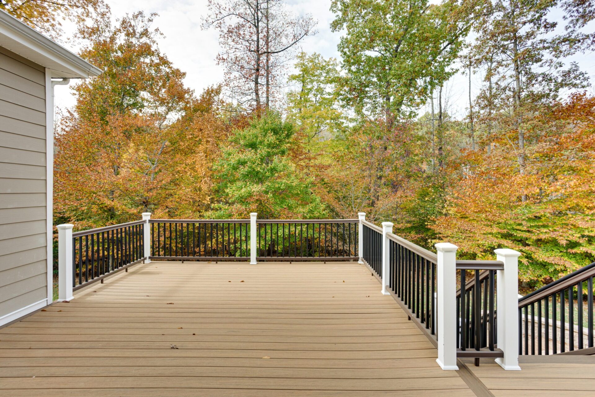 Spacious,Wooden,Deck,Overlooking,Autumn,Forest,View