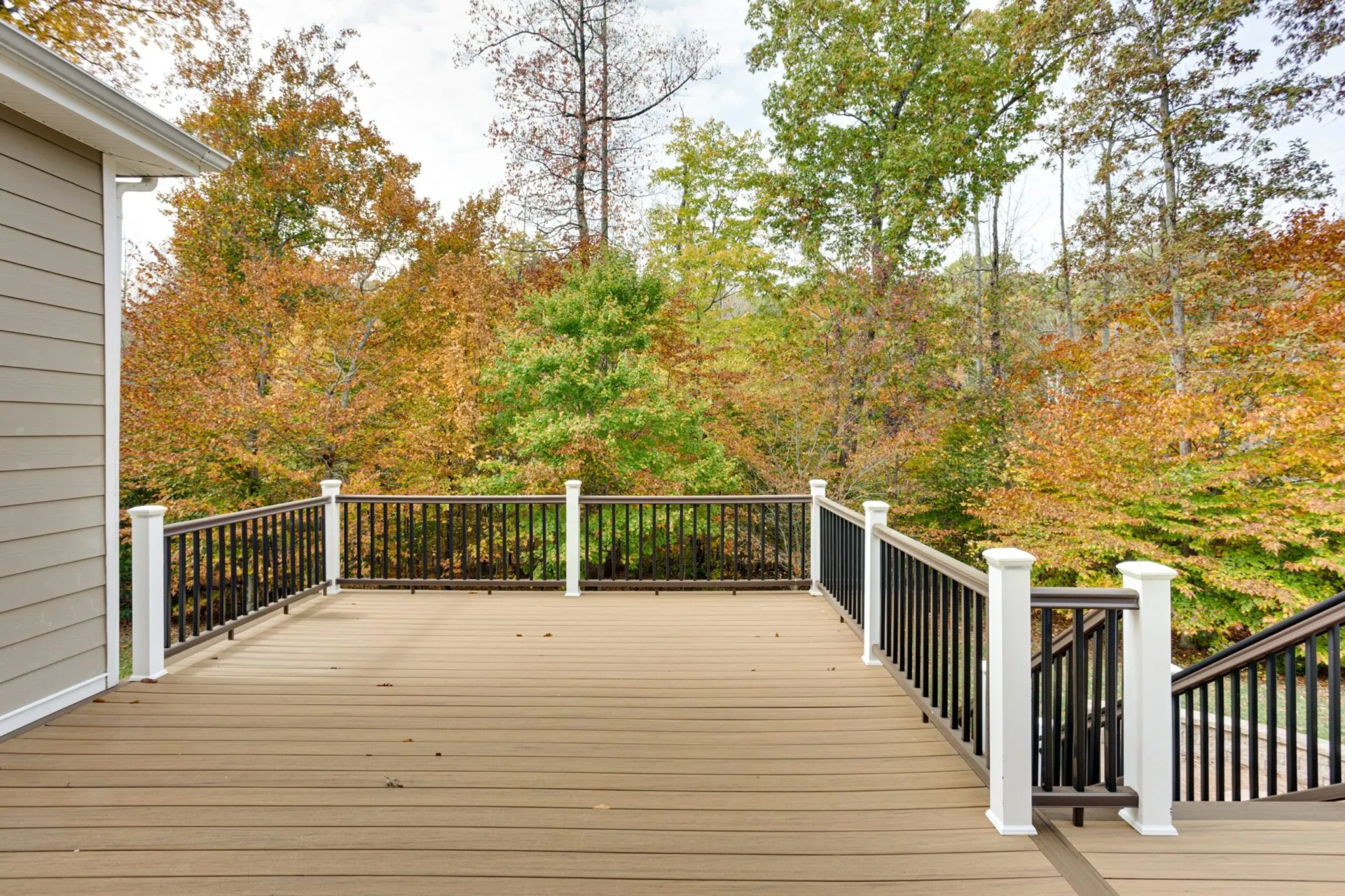 Spacious,Wooden,Deck,Overlooking,Autumn,Forest,View